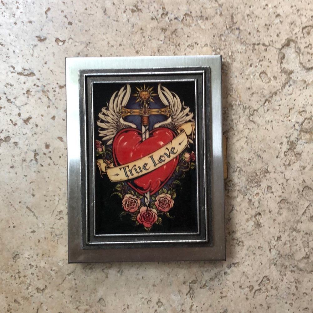 Business card holder with heart and cross